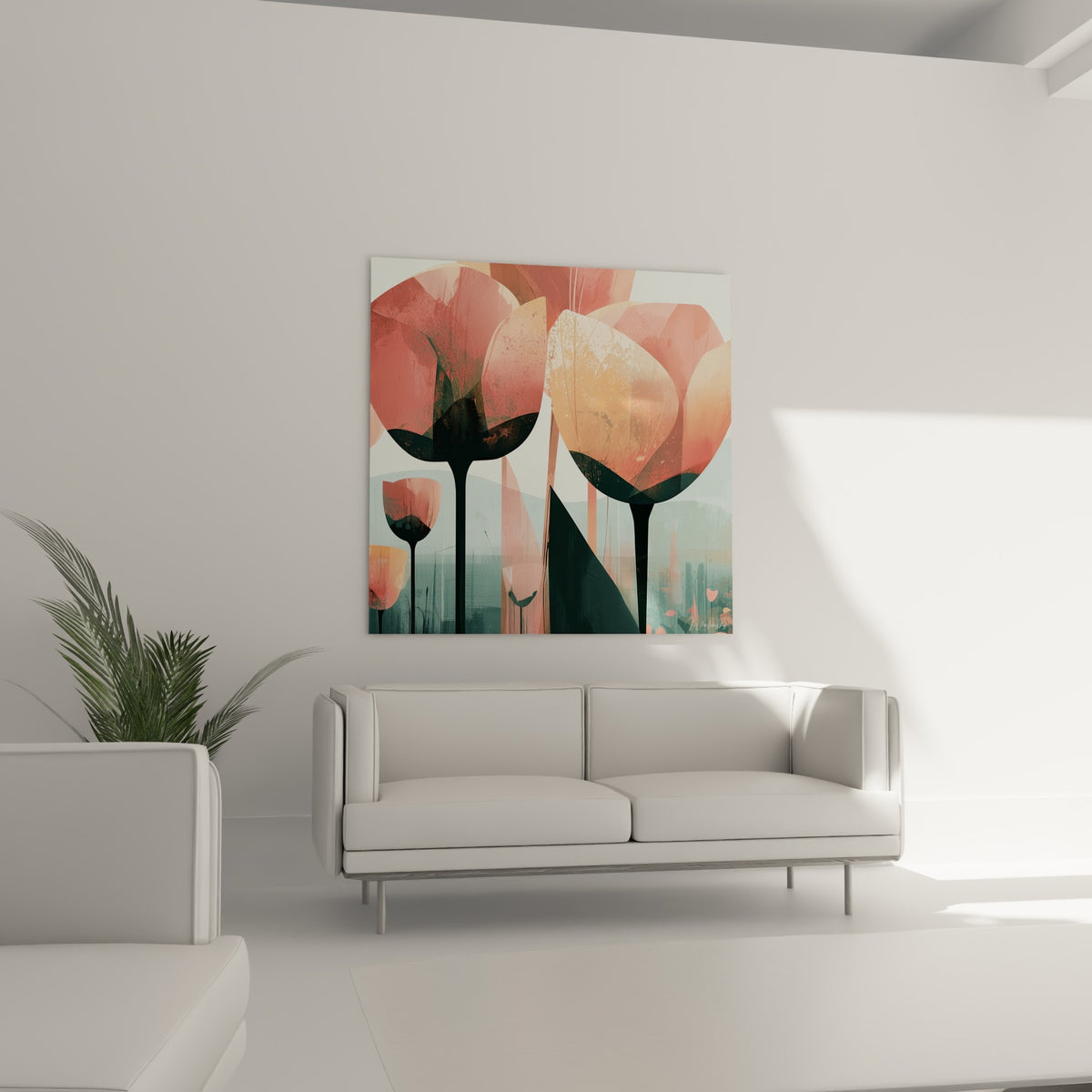 Fleurs roses et pêche aux tiges sombres composant ce tableau au-dessus d'un canapé dans un salon lumineux