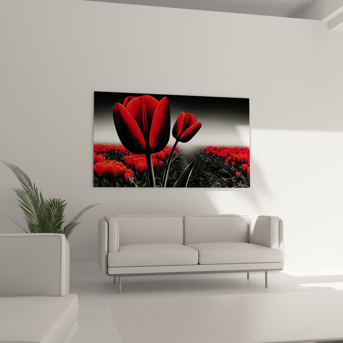Fleurs rouges et noires émergeant d'un champ flou, disposées au-dessus d'un canapé dans un salon lumineux