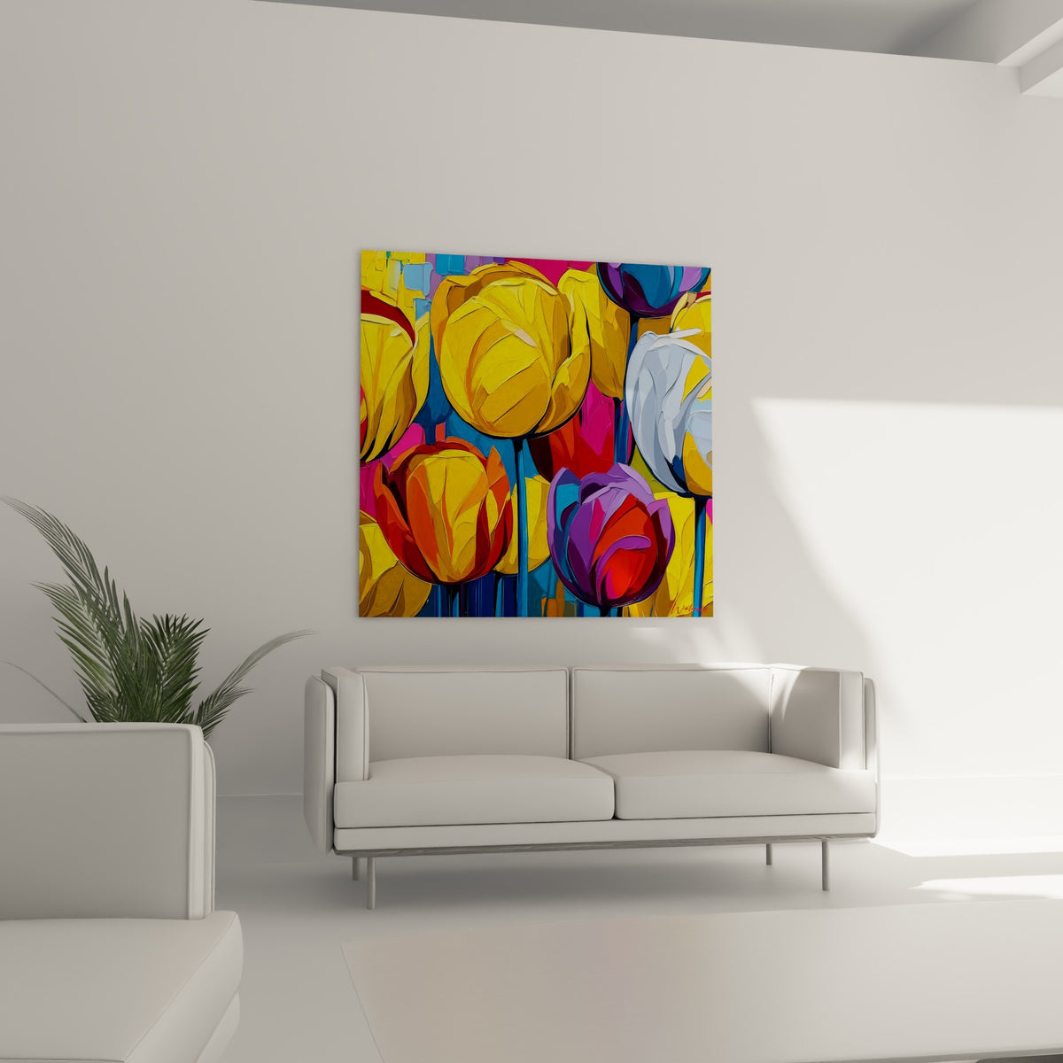 Bouquet de tulipes orangées et bleu marine suspendu au-dessus d'un canapé dans un salon lumineux