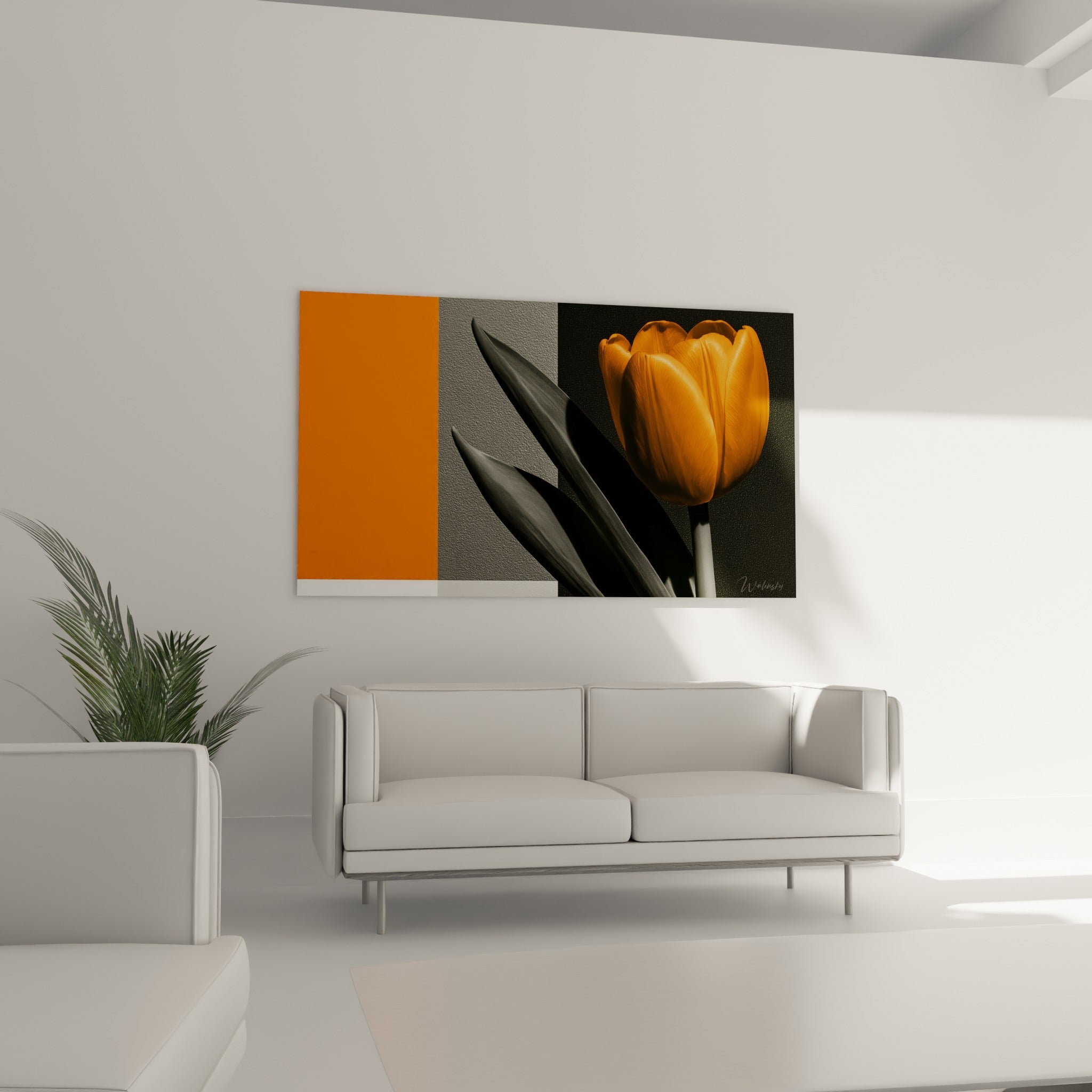 Fleur orange et feuilles grises d'une tulipe suspendue au-dessus d'un canapé dans un salon lumineux