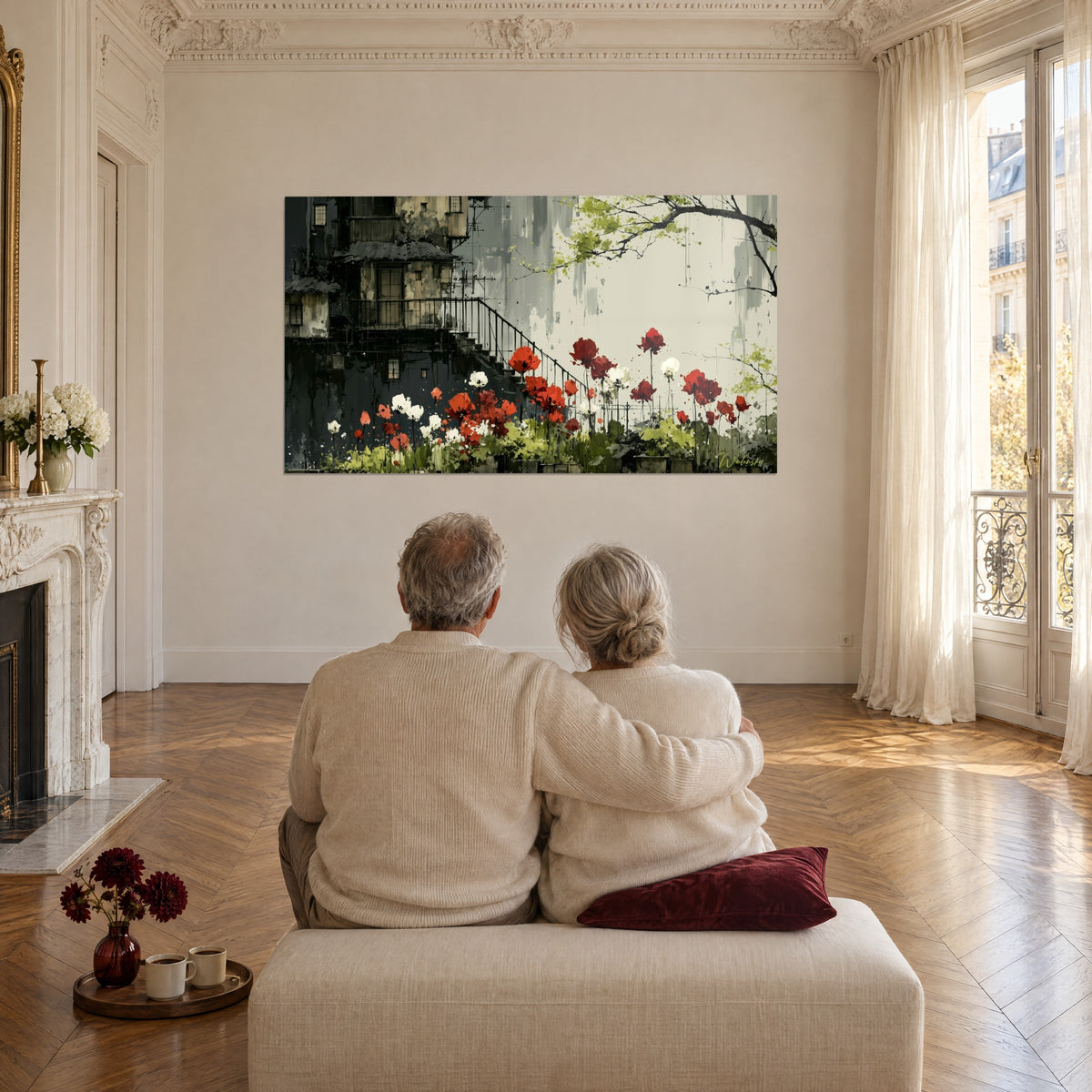 Tableau fleurs vermillon dressées devant une maison grise, ciel pâle, contemplé par un couple âgé enlacé sur un pouf