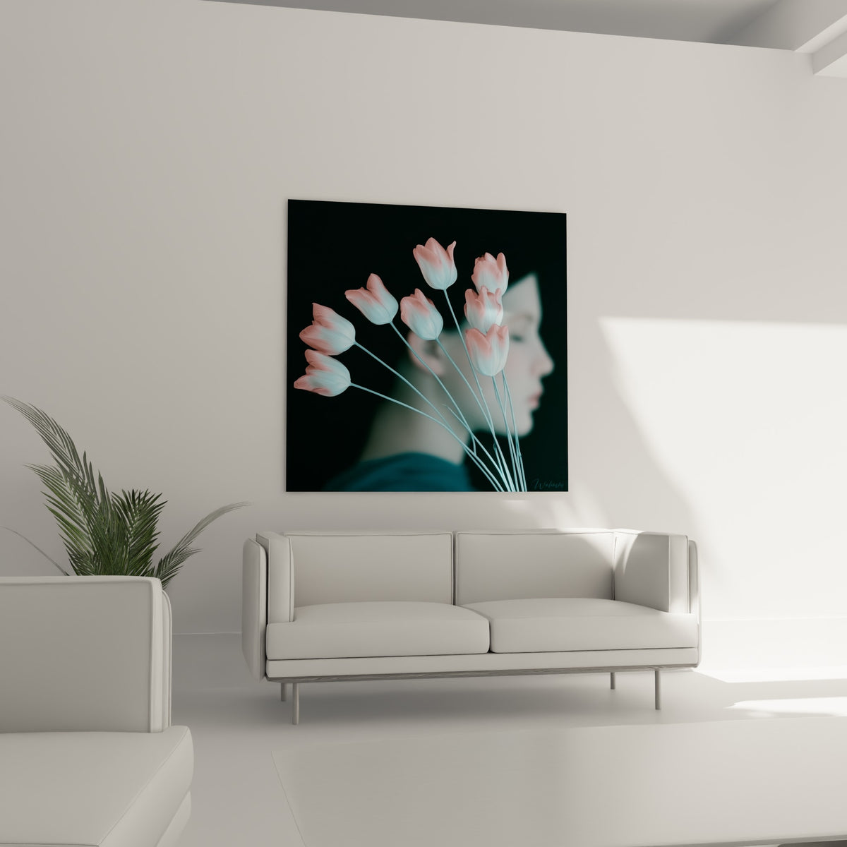 Sept tulipes dégradées rose et bleu givré placées au-dessus d'un canapé dans un salon lumineux