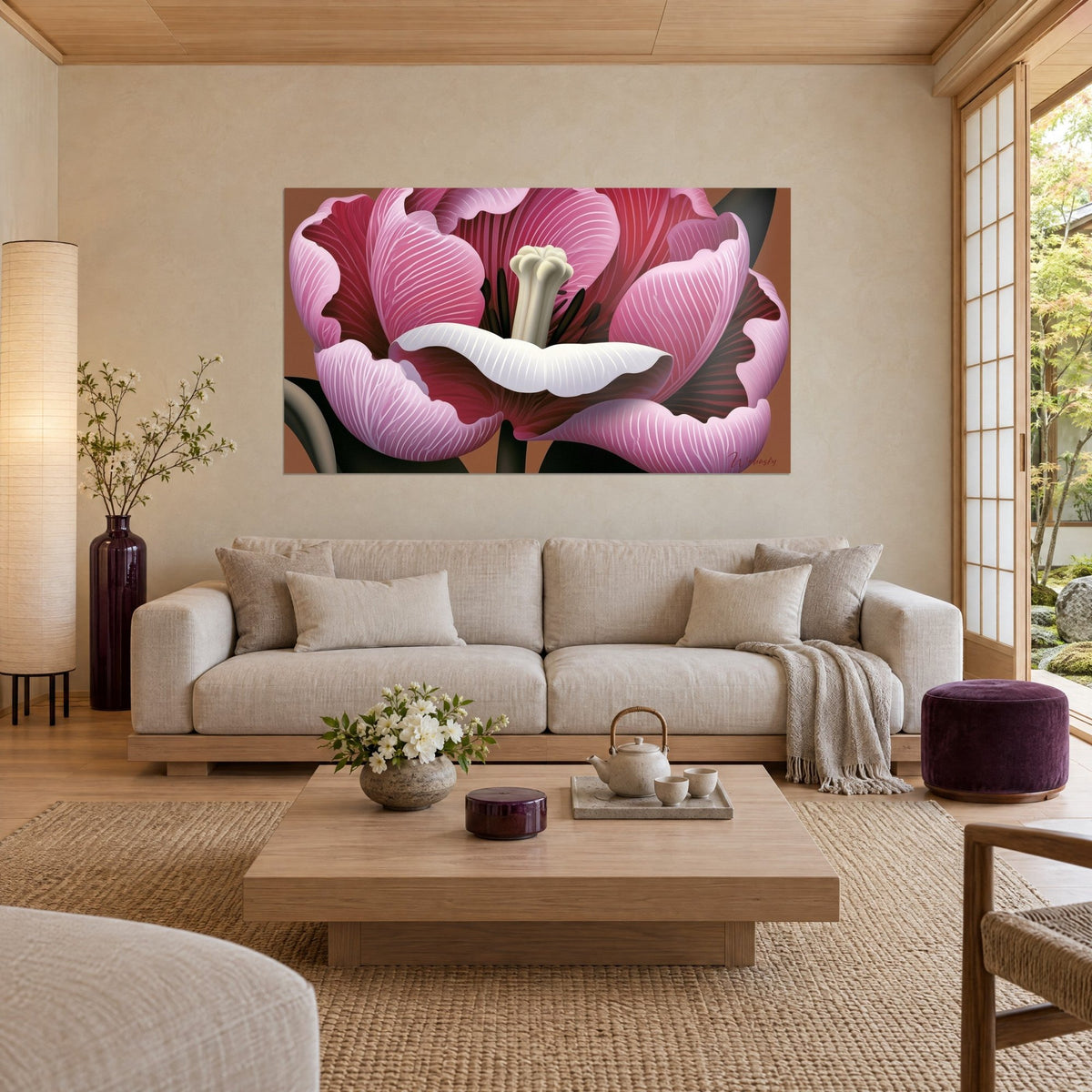 Wall art of a blooming tulip with pale pink petals veined in white, burgundy heart, above a sofa in a bright living room