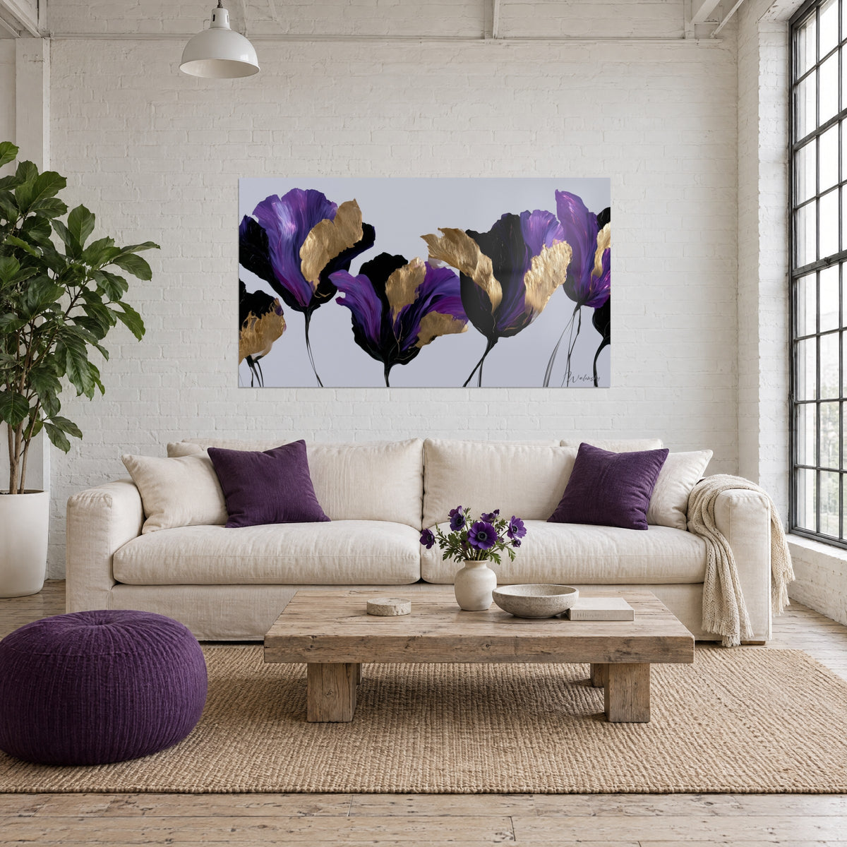 Wall art of purple tulips with golden petals on pearl grey background, slender black stems, hung above a sofa in a bright living room