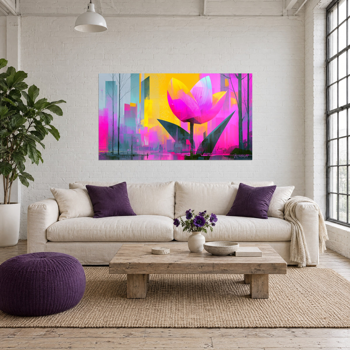 Wall art of a giant tulip with fuchsia and lemon-yellow petals in front of grey-blue skyscrapers, above a sofa in a bright living room