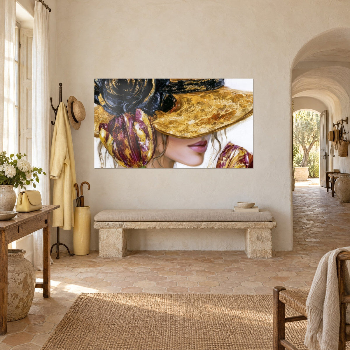 Wall art of an elegant woman with a gold hat hiding her eyes, rosy lips, burgundy and yellow tulips, three-quarter view in a Provençal farmhouse