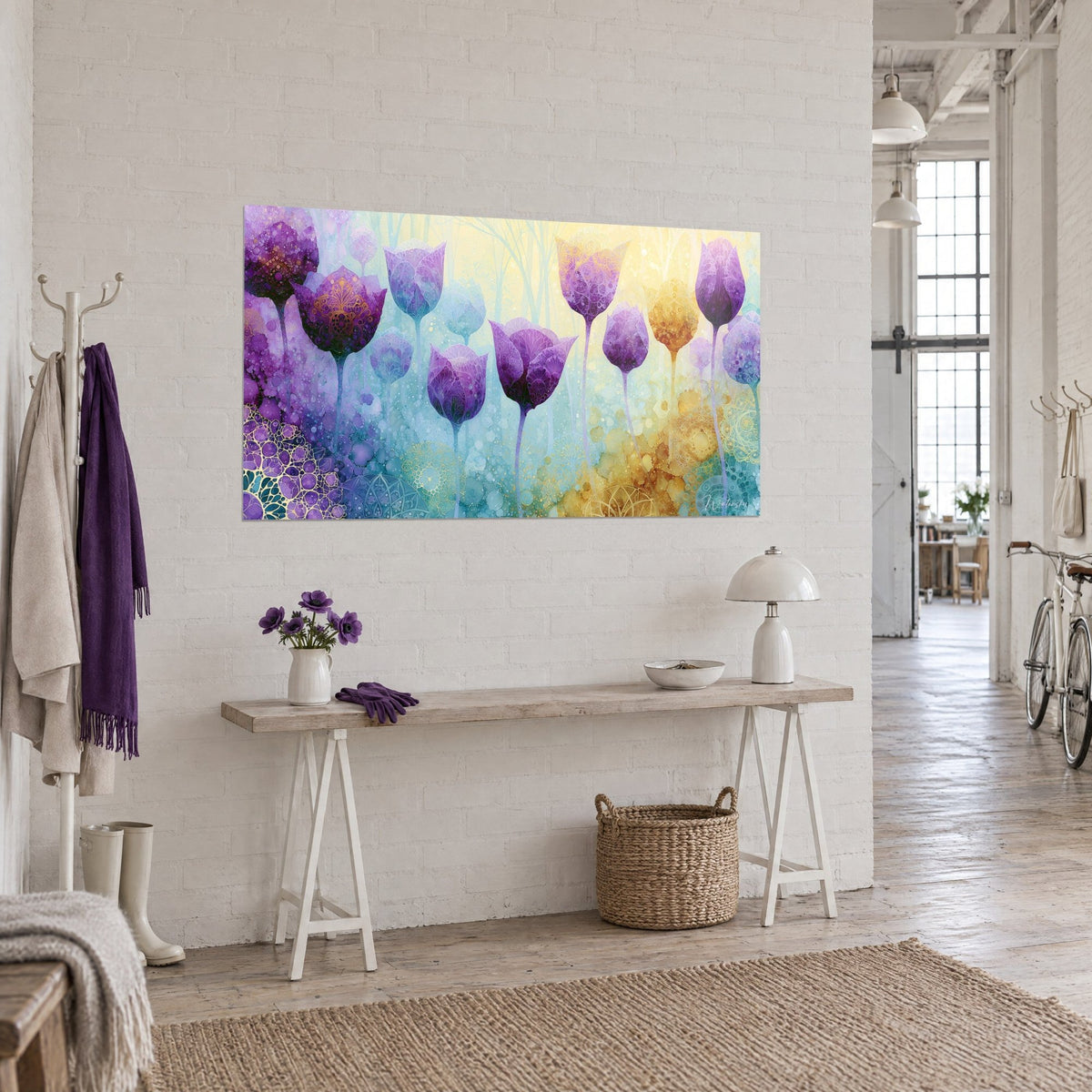 Wall art purple bulb flowers on a background of turquoise and pale yellow ink, hung on the white wall of a loft entrance