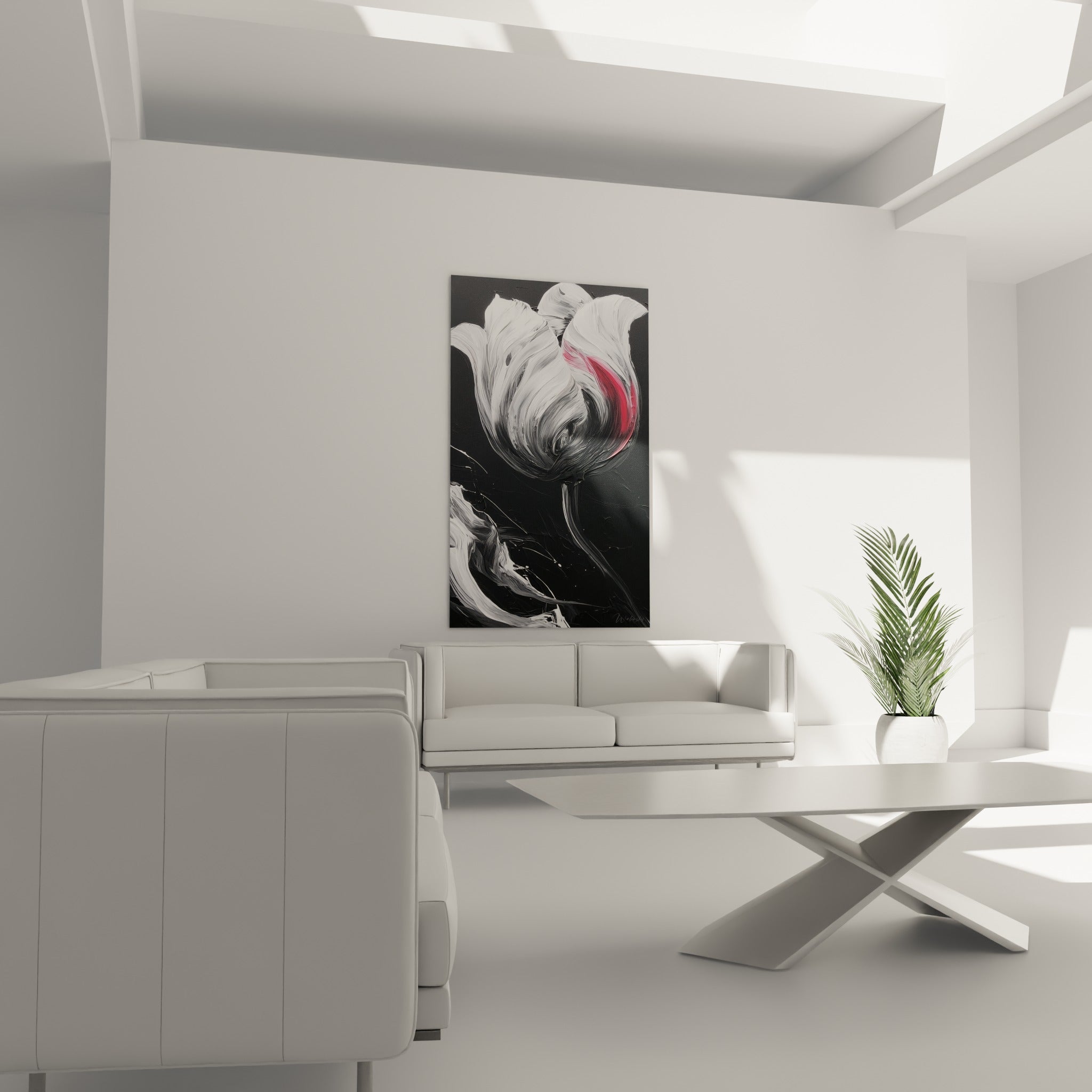 Fleur de tulipe noire et blanche à la touche rouge intense, suspendue au-dessus d'un canapé dans un salon lumineux