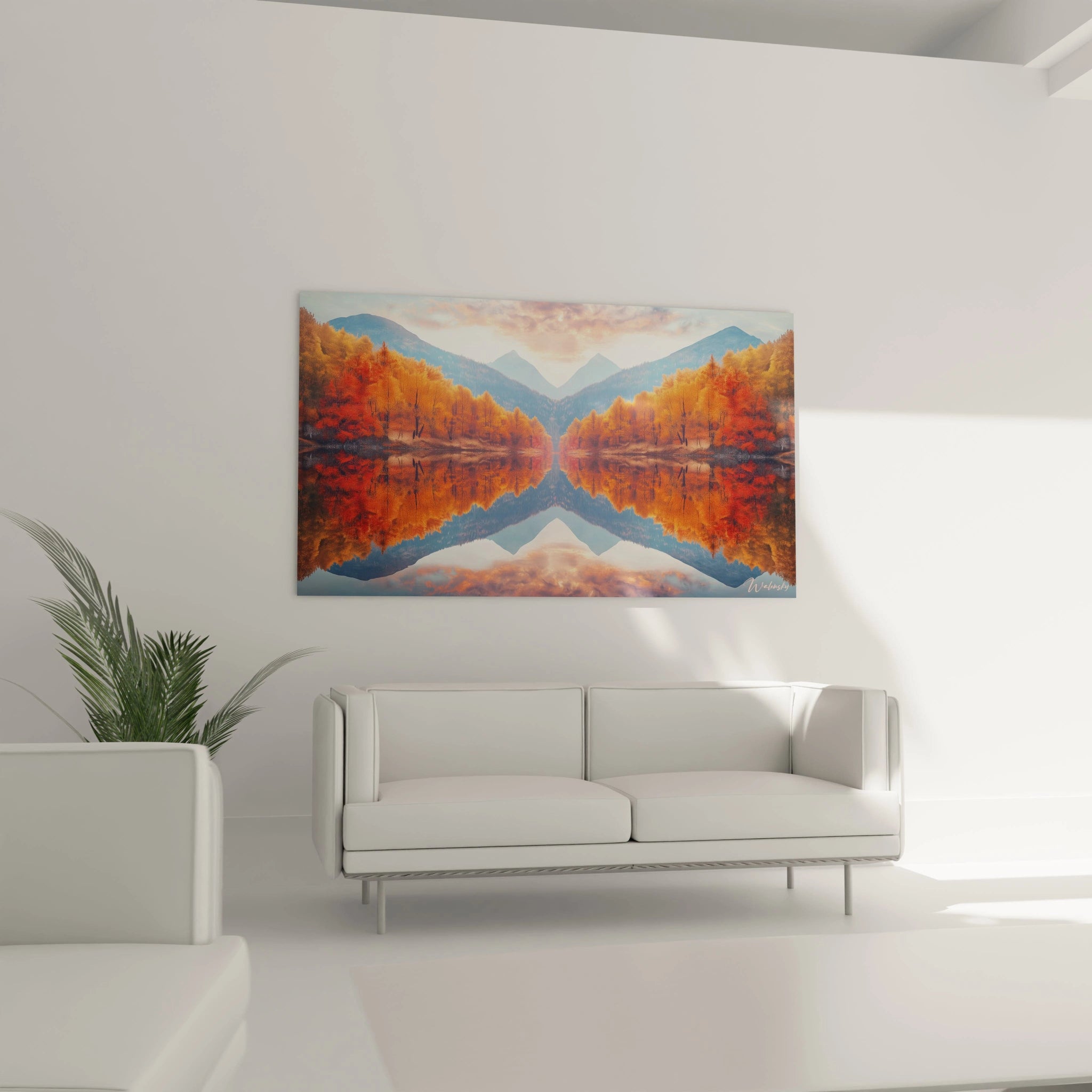 Tableau forêt montrant une vallée montagneuse bordée d'arbres aux couleurs automnales flamboyantes, parfaitement dupliquée dans le reflet d'un lac calme, créant un effet miroir saisissant entre le paysage réel et son image inversée.
