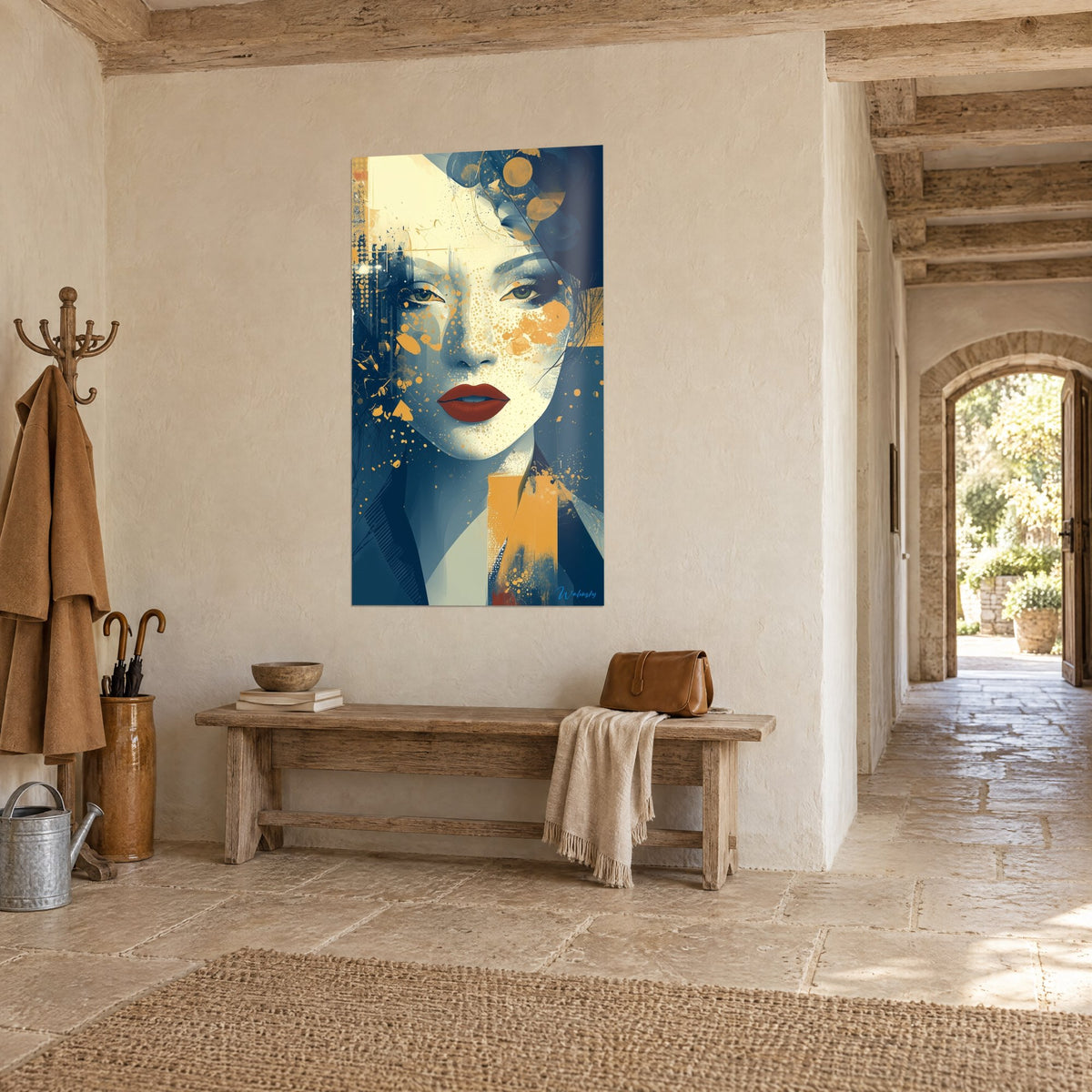 Wall art stylised face with green eyes, ochre cheeks and black strands, three-quarter view on a cream stone wall