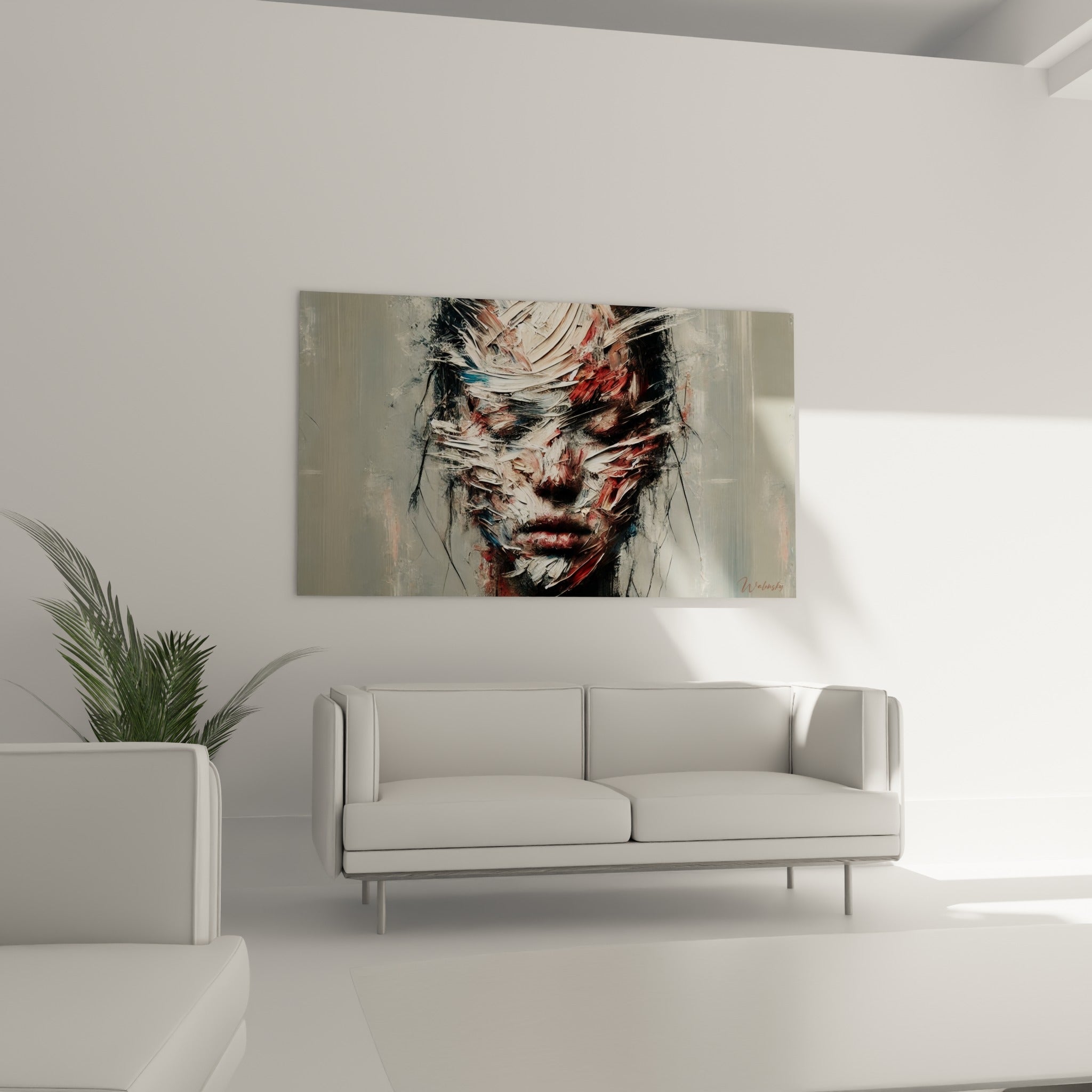 Figure abstraite en empâtements blancs et rouges suspendue au-dessus d'un canapé dans un salon lumineux