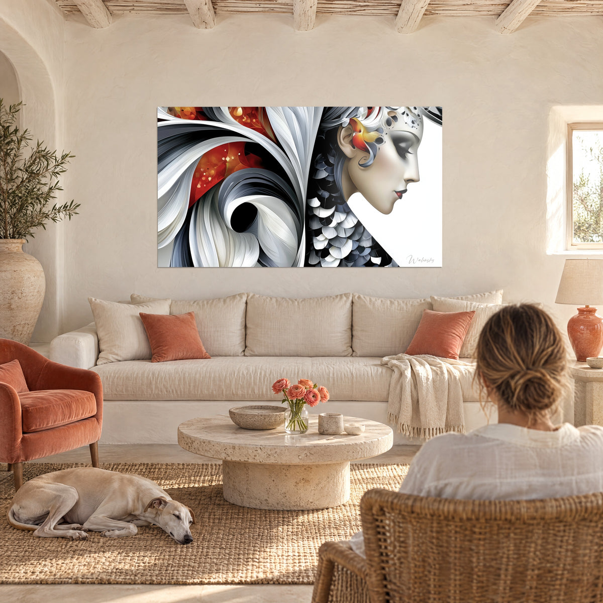 Wall art woman profile in porcelain, black and white feathers, red spiral, above a sofa in a bright living room