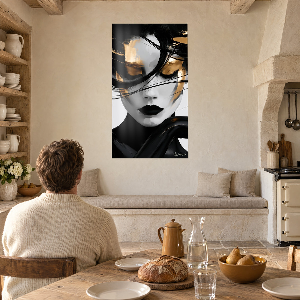 Wall art figure with closed eyes, black ink strands and golden brushstrokes, facing a rustic wooden farmhouse table