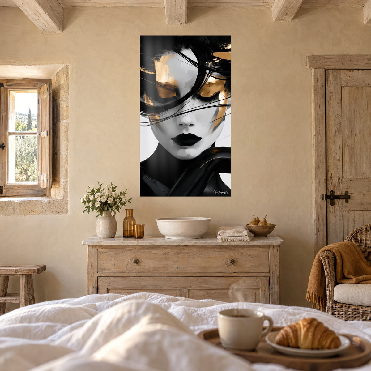 Wall art female silhouette with swept-back hair, gold highlights on black and white background, above a bed in a light bedroom