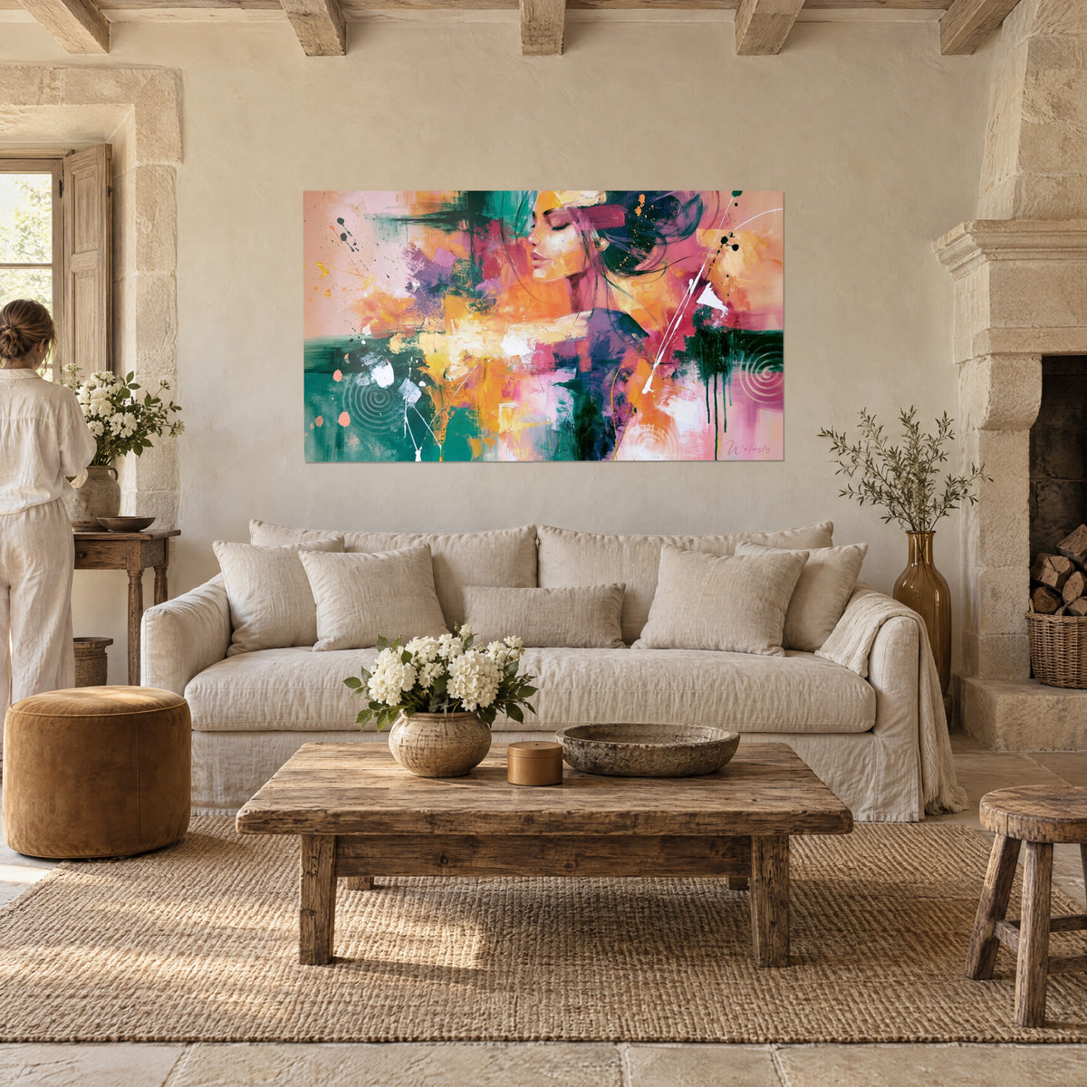 Wall art woman's face with closed eyelids, saffron orange and emerald green, above a sofa in a bright living room