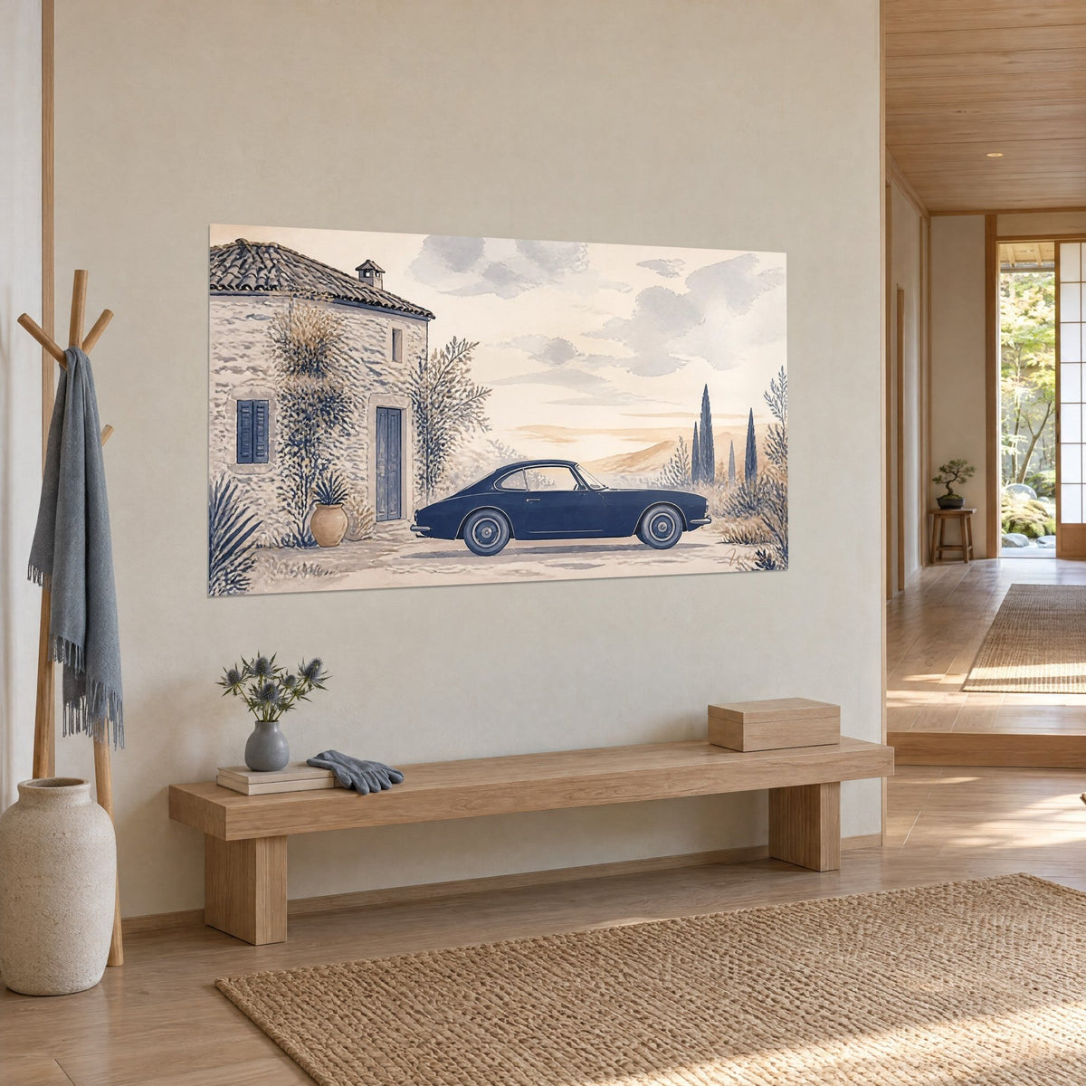 Wall art of an indigo vintage car beside a blue door, ochre hill on the horizon, hung in a japandi entryway with light wood