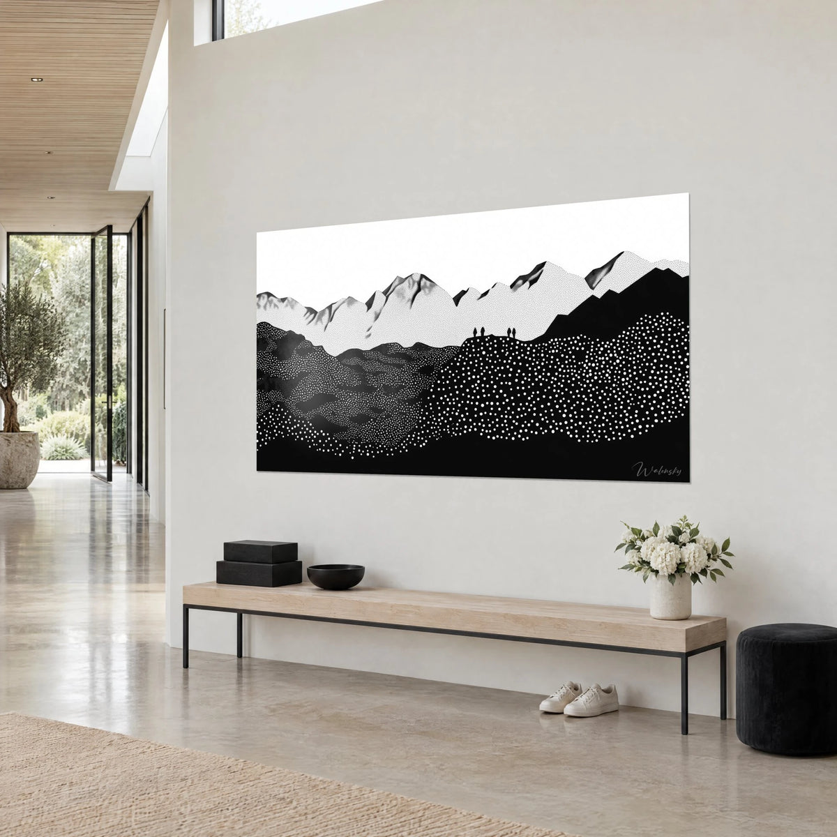 Wall art alpine panorama in stippling, white peaks sculpted with black shadows, hills speckled with dots, in an architect's living room