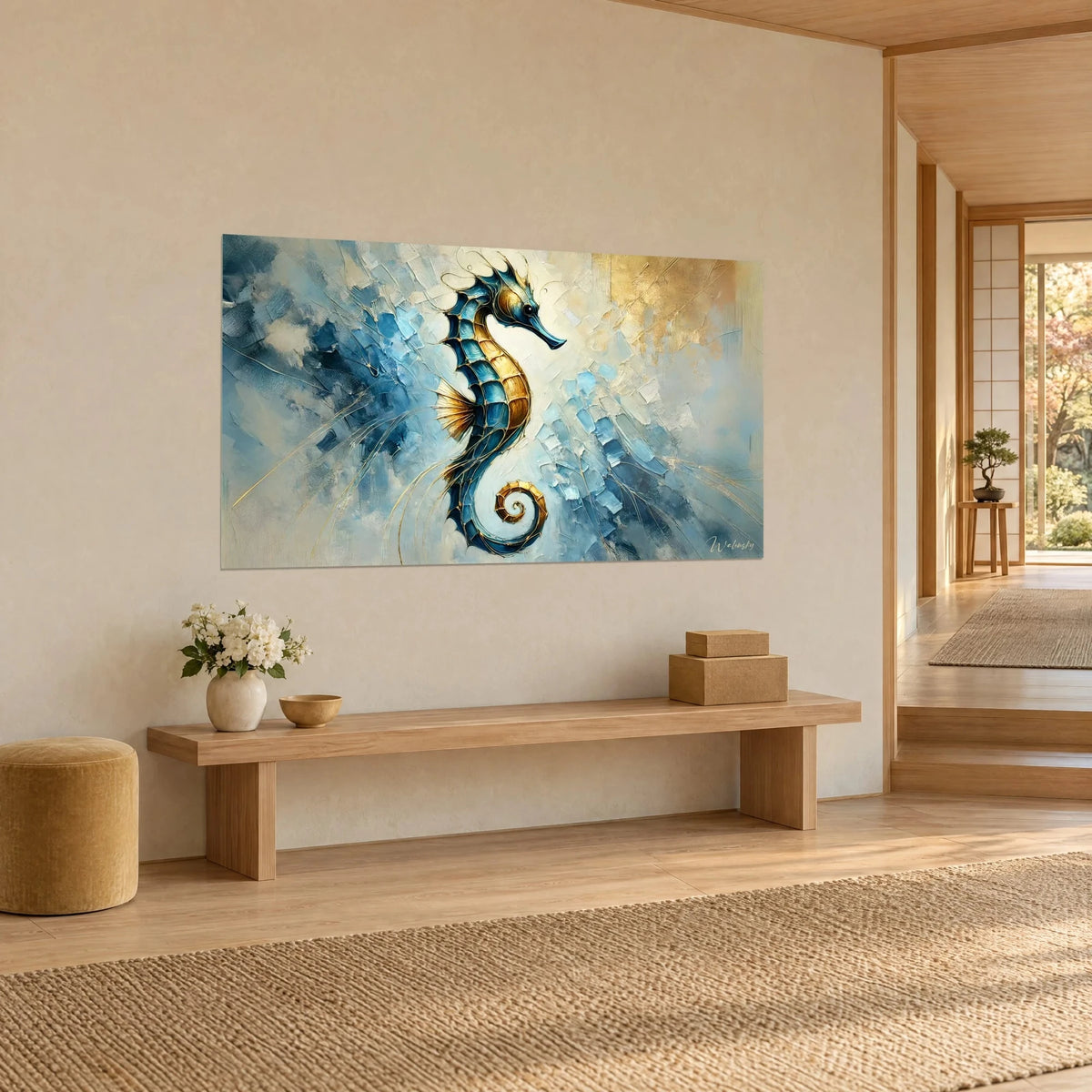 Wall art azure and golden ochre seahorse, tail curled over thick impasto background, wooden console, cream wall, three-quarter view