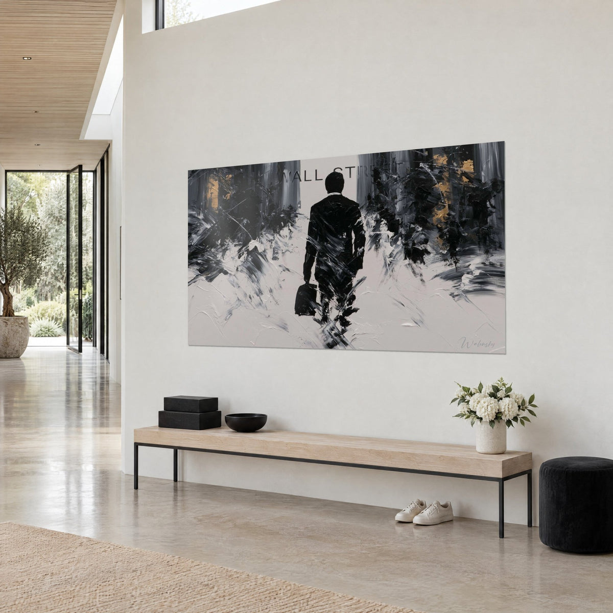 Wall art banker in a dark suit carrying his briefcase, thick white and black brushstrokes, gold highlights, cream wall beside a wooden bench