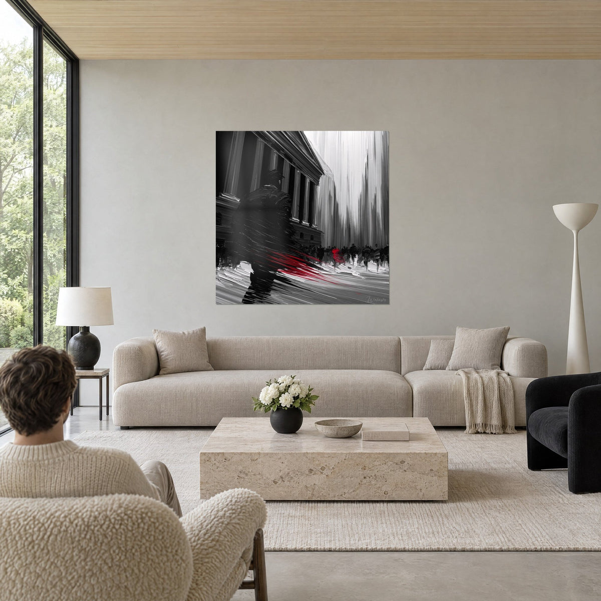 Tableau homme en manteau noir hâtif devant un temple à colonnes, traînée rouge vif, fond gris, au-dessus d'un canapé dans un salon lumineux