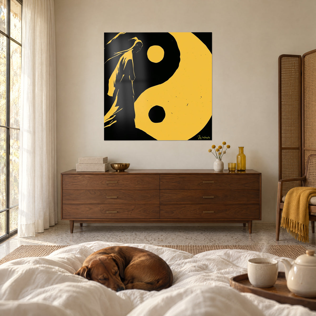 Wall art yellow and black yin yang symbol, bent figure with hair blowing in the wind, above a bed in a bright bedroom