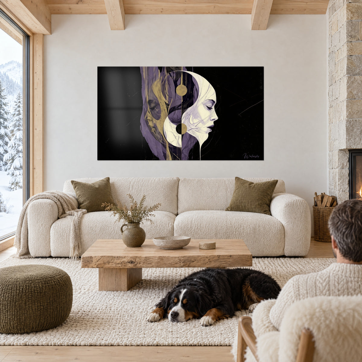 Wall art profile of a woman in ivory with closed eyelids, violet and gold veils on a black background, above a sofa in a bright living room
