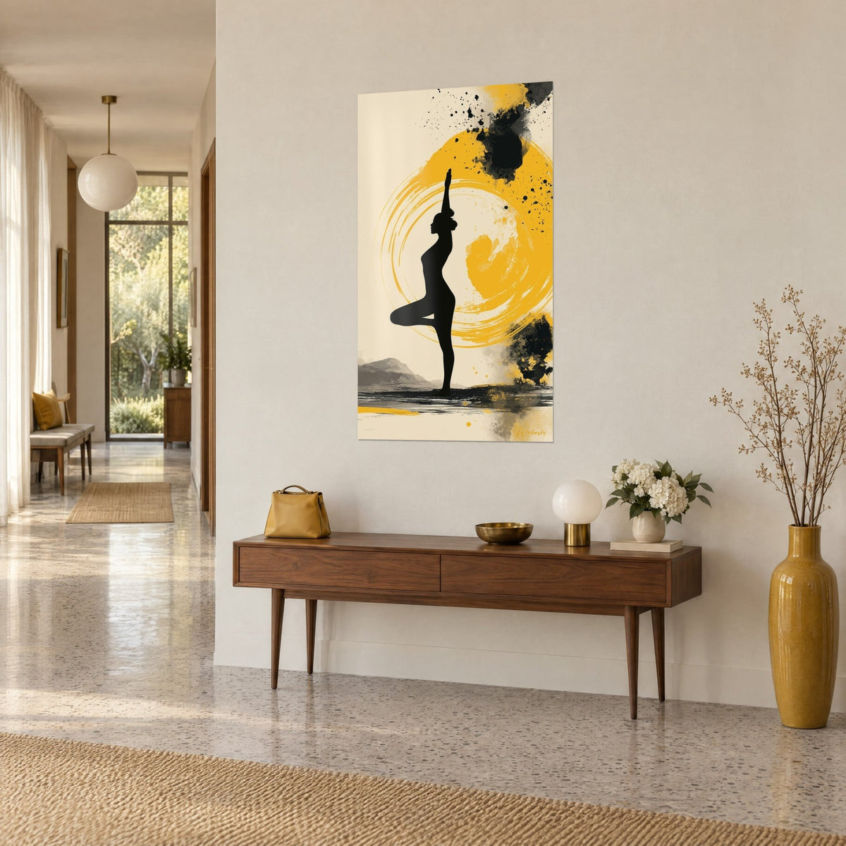 Wall art yogi in shadow silhouette, arm reaching toward a saffron yellow circle on cream background, above a wooden console seen three-quarter view