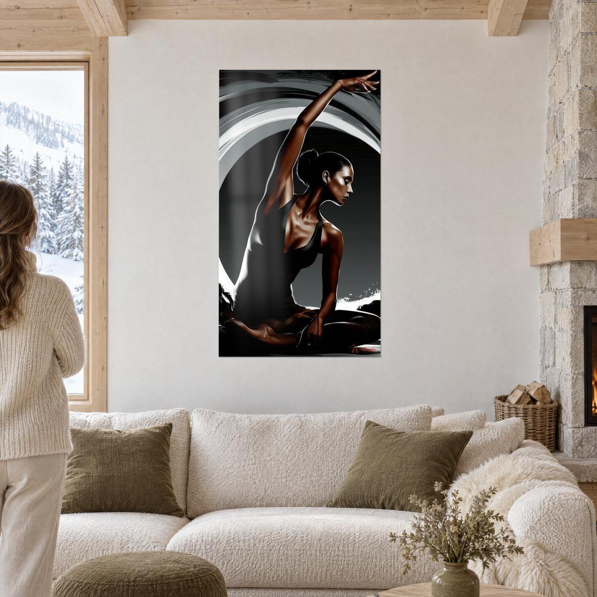 Wall art yogini arm stretched in an arc, copper skin on grey and white circle, above a sofa in a bright living room