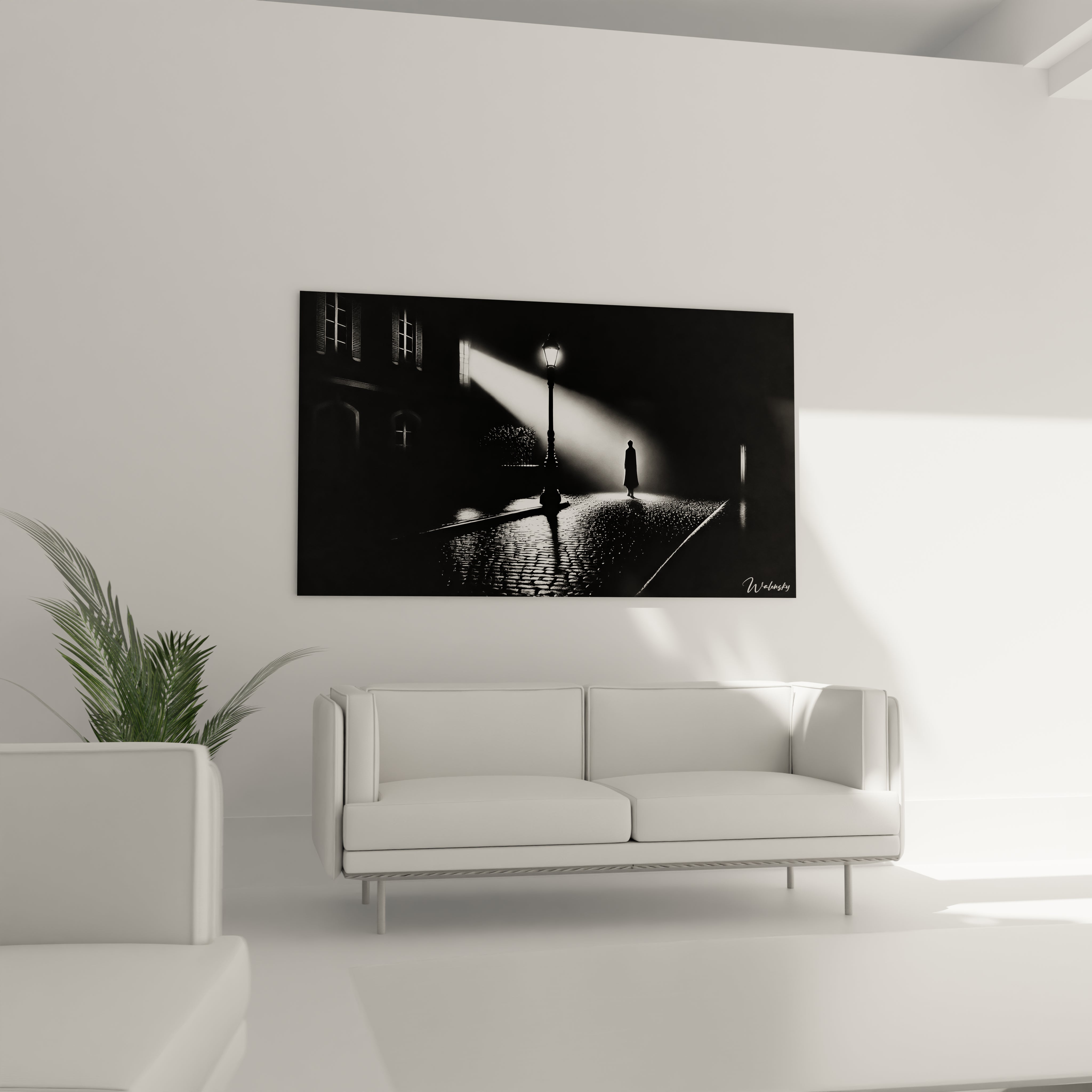 tableau noir et blanc installé dans un salon moderne au-dessus d'un canapé mettant en valeur une silhouette sous un réverbère ambiance cinématographique et élégante

