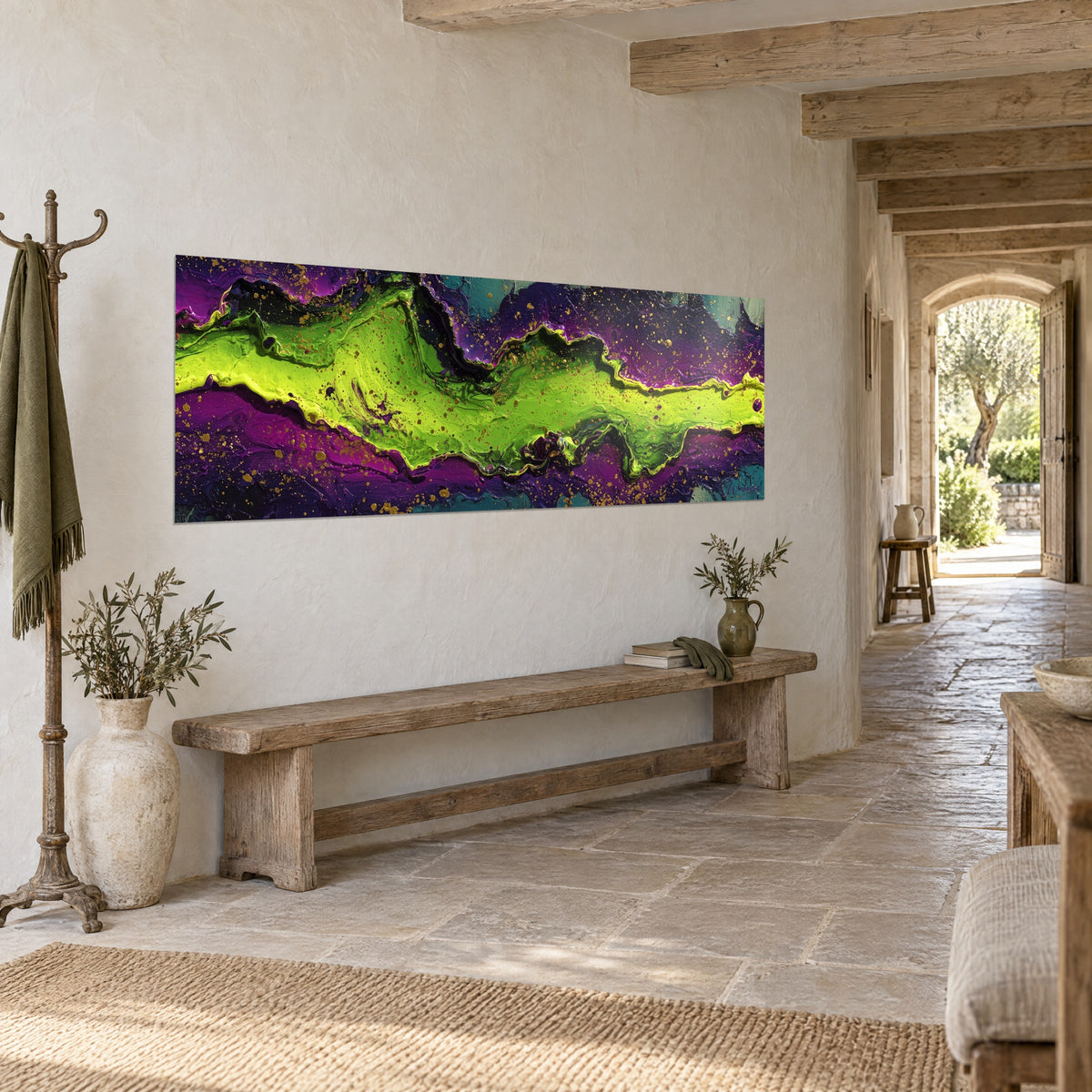 Wall art with a wide flow of lime green and plum paint, golden vein, on a white wall beside a wooden bench, rustic stone