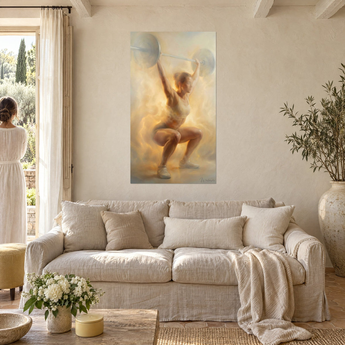 Wall art of a female weightlifter in a squat, barbell held overhead, ochre and cream haze, above a sofa in a bright living room