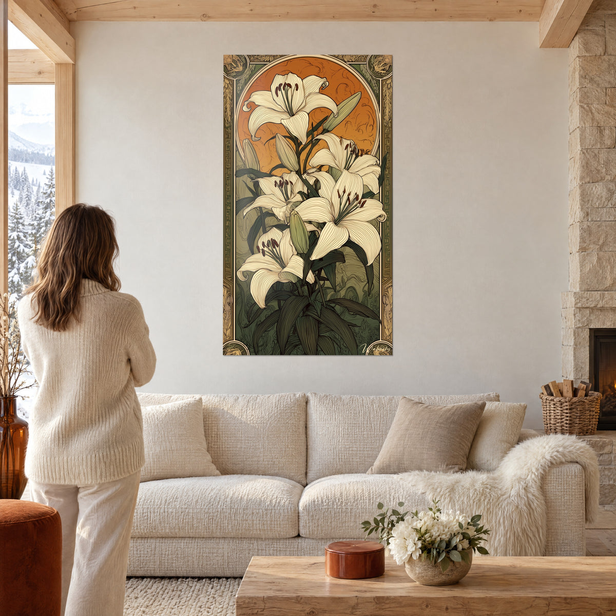 Tableau lys blancs aux étamines rouille sur fond orange et vert sauge, cadre art déco, au-dessus d'un canapé dans un salon lumineux