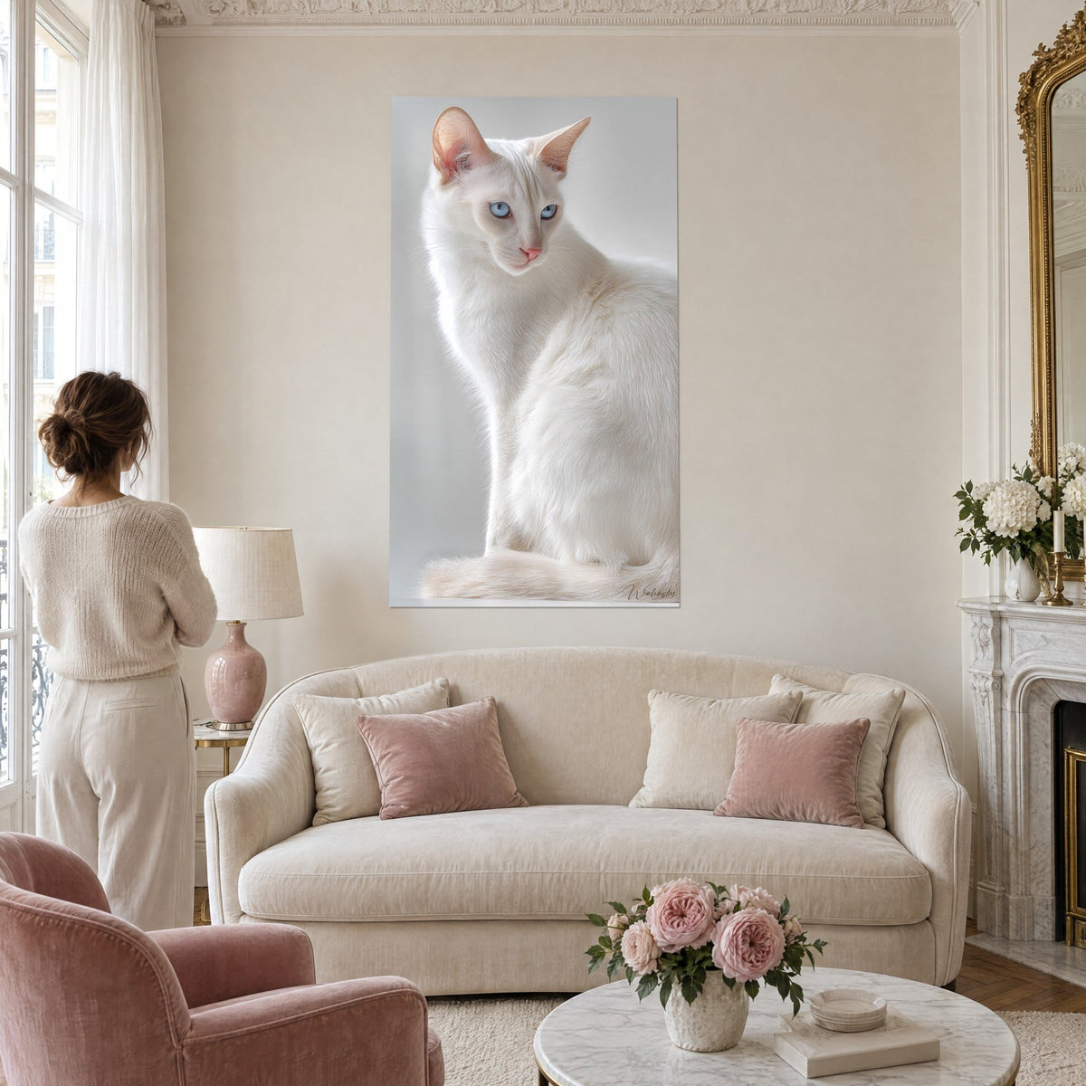 Wall art white Balinese cat with pale blue eyes and pink ears, a woman seen from behind, above a sofa in a bright living room