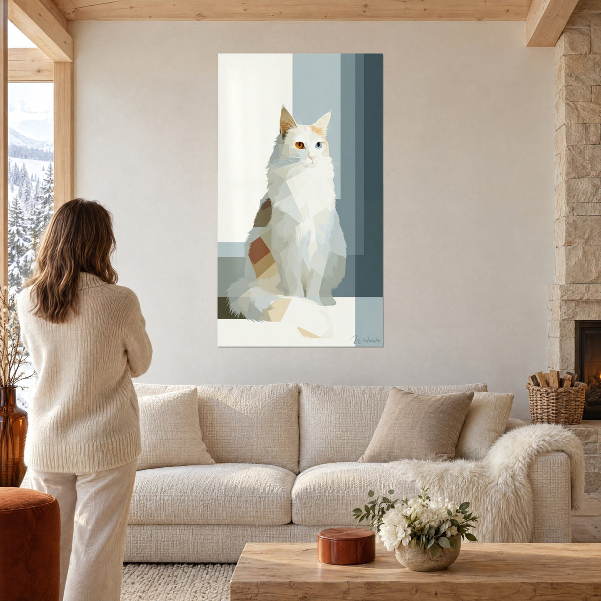 Obraz siedzącego kota Turkish Van w niebiesko-szarych i kremowych płaszczyznach, oczy o różnych kolorach, nad sofą w jasnym salonie