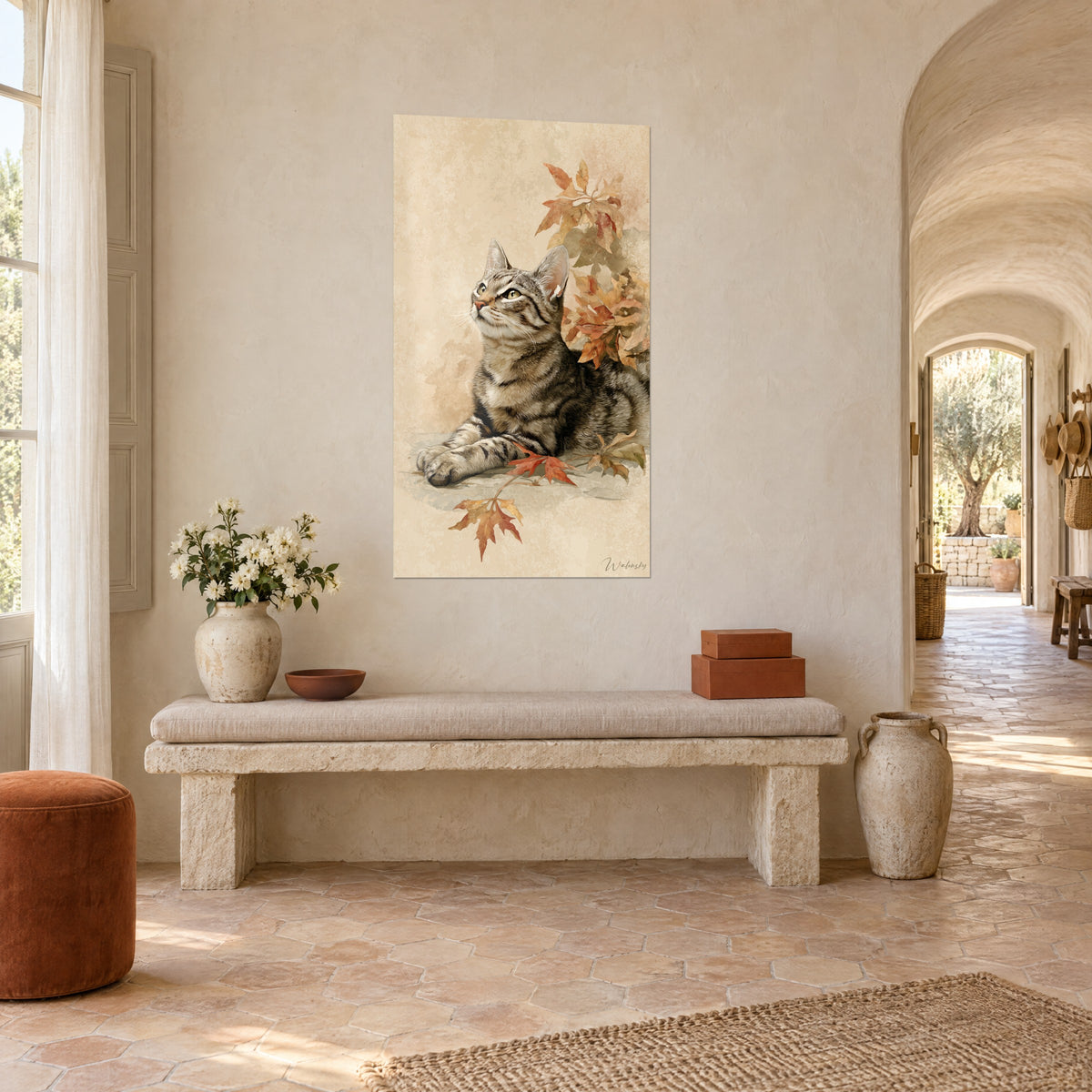Wall art grey and brown striped cat lying among orange leaves, cream background, above a stone bench in a Provençal farmhouse