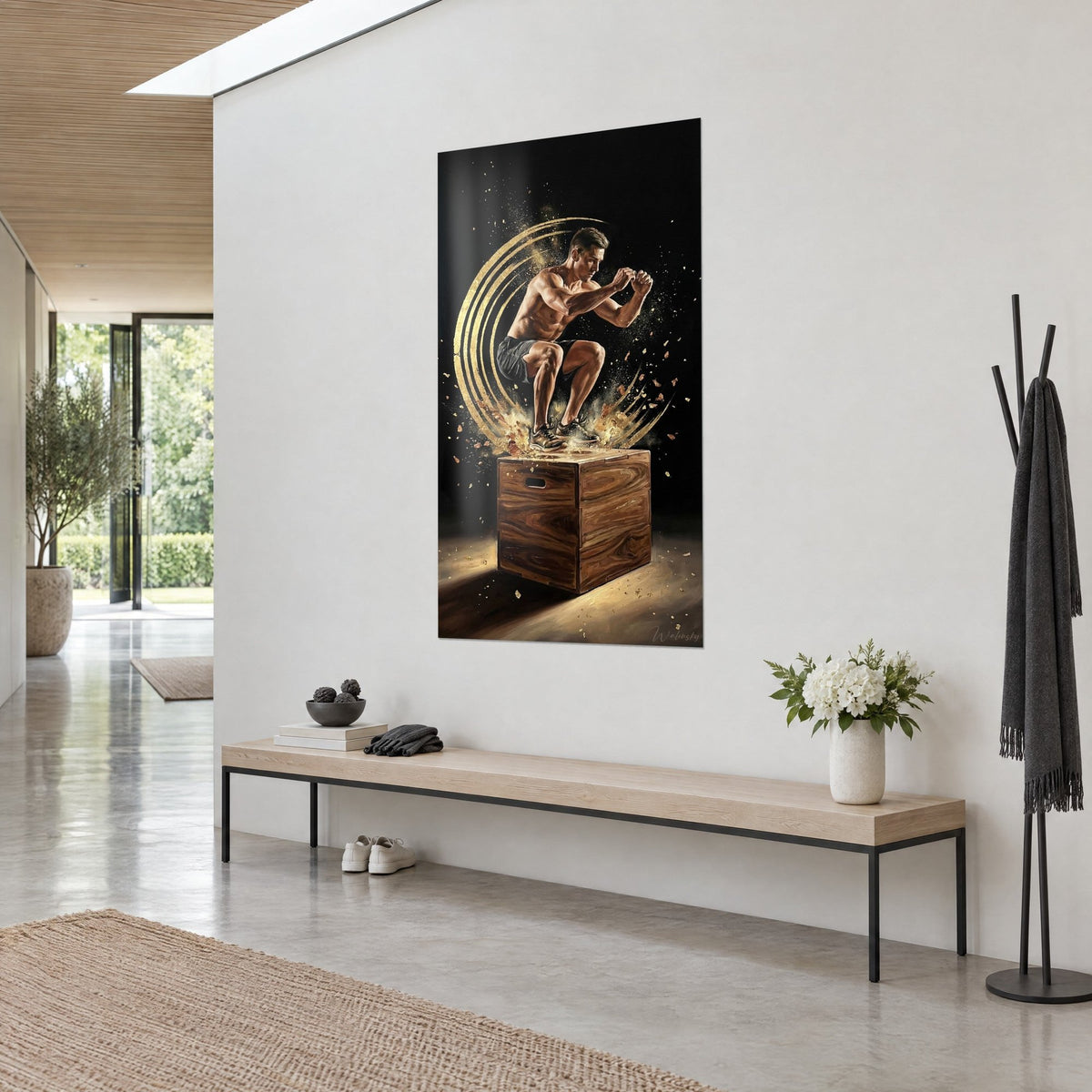 Wall art of a sportsman mid-jump, gold dust and brown wooden box, three-quarter view in a bright hallway, blond bench