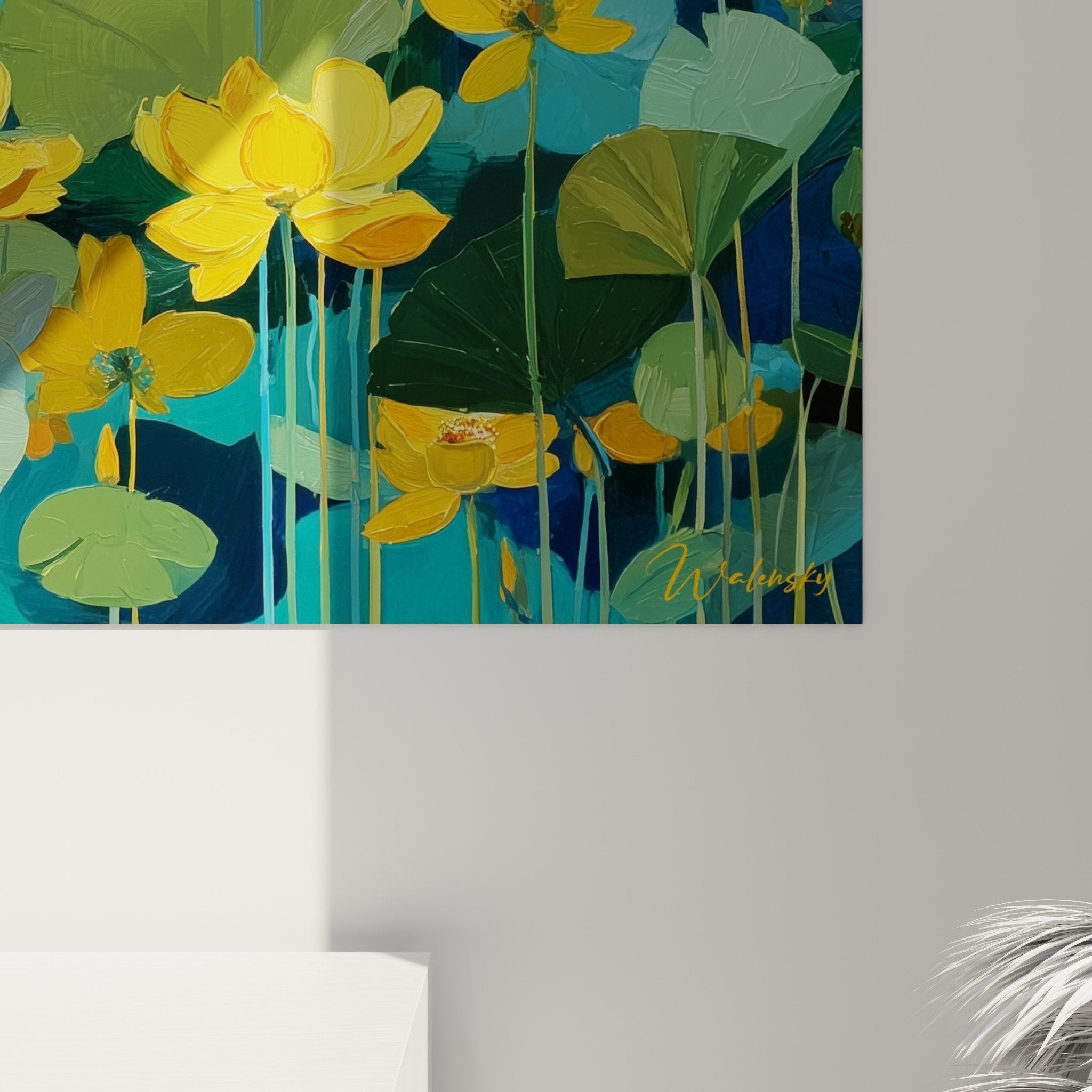 Overview of aquatic floral composition, golden water lilies and green foliage on blue-turquoise pond