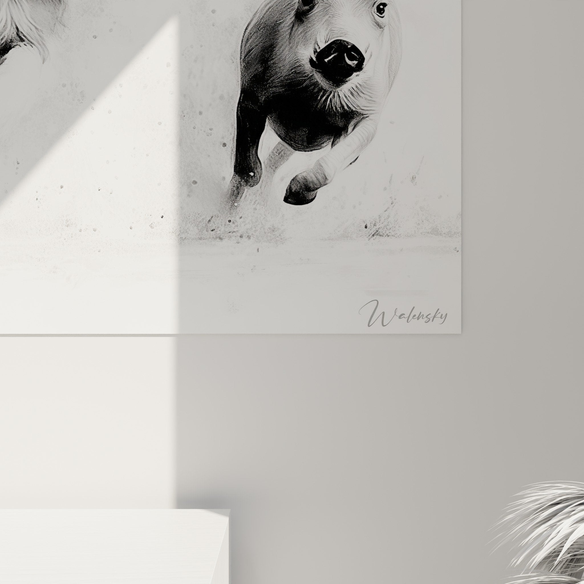 Overview of black and white lion wall art in contemporary living room with designer furniture
