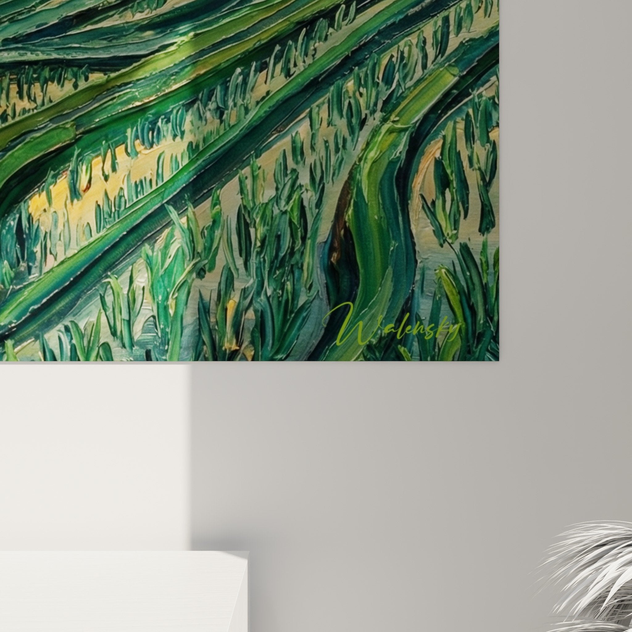 Overview of the terraced rice fields painting in green and gold tones in a Bali-style interior